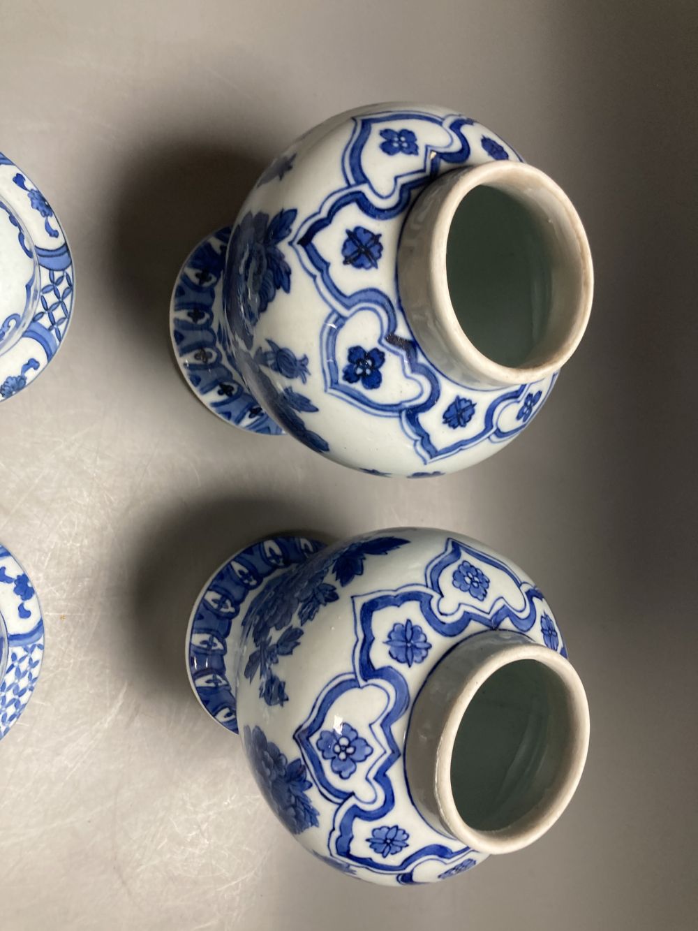 A Chinese famille rose dessert dish, 27cm, assorted Chinese blue and white porcelain and a delft ware hanging candle lantern, 26cm